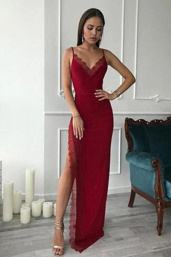 Red mermaid sheath prom dress with spaghetti straps and a high side slit.
