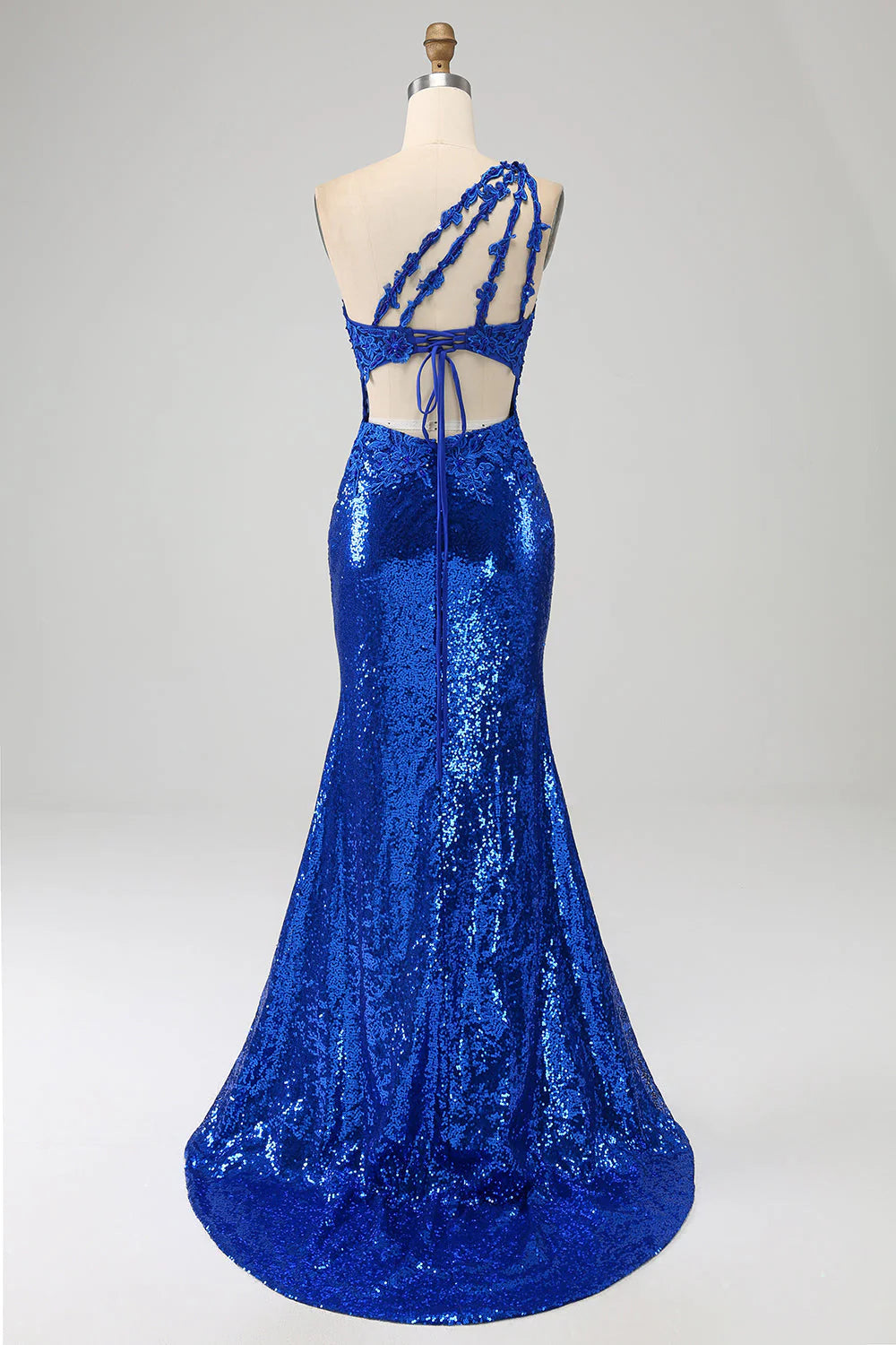 Elegant royal blue one-shoulder gown for formal events.