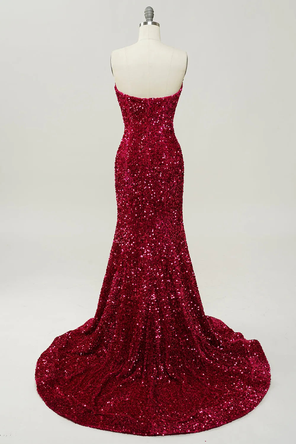 Side view of the sequined mermaid prom dress, highlighting the silhouette.