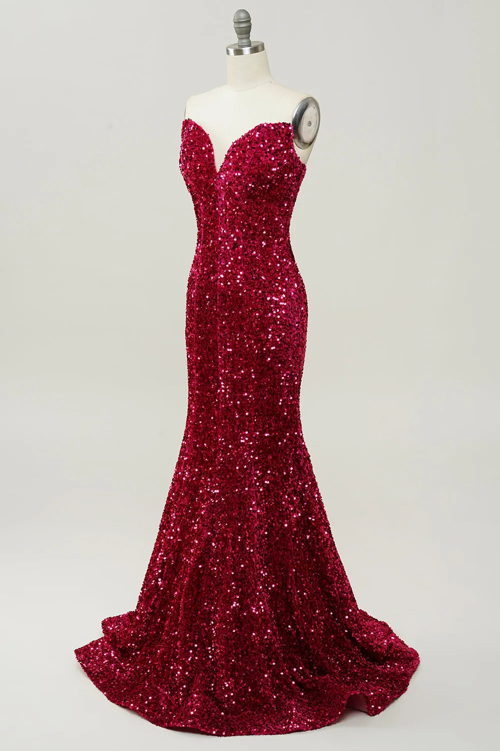 Full length view of the sequined mermaid dress, showing the sweep train.