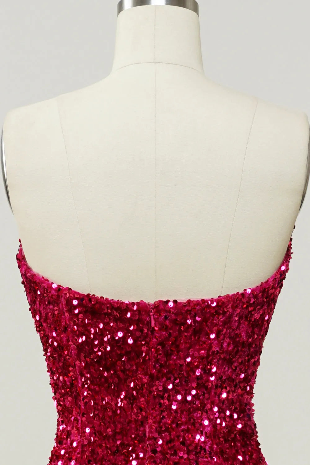 Another angle of the model in the glamorous sequined prom dress.