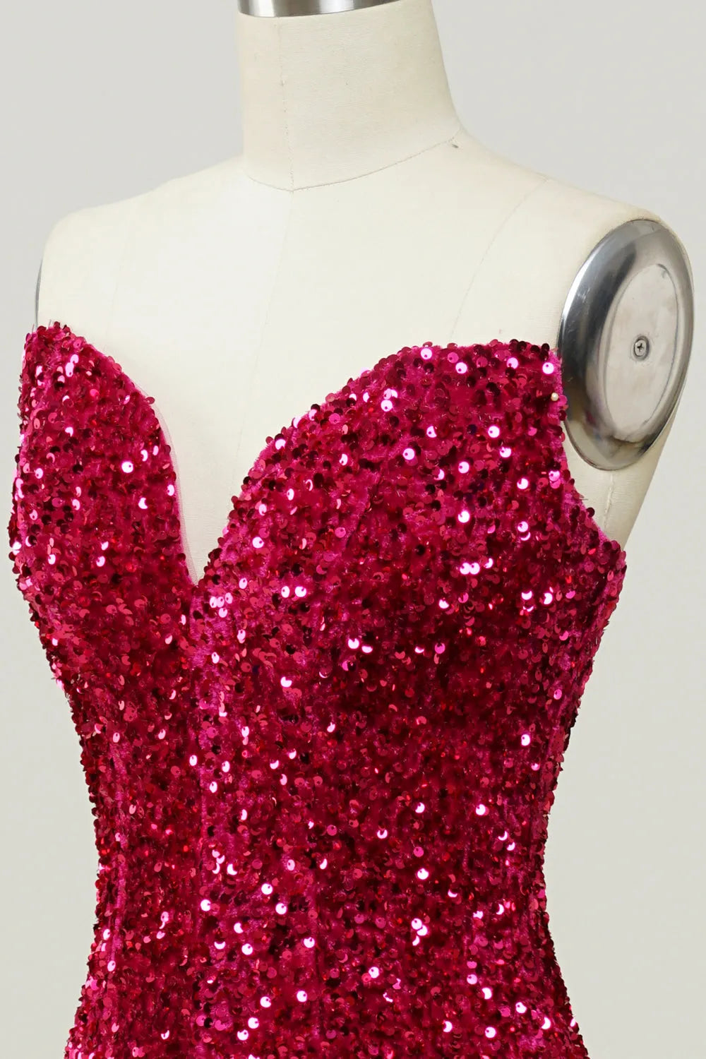 Detail of the sweetheart neckline and sequin embellishments.