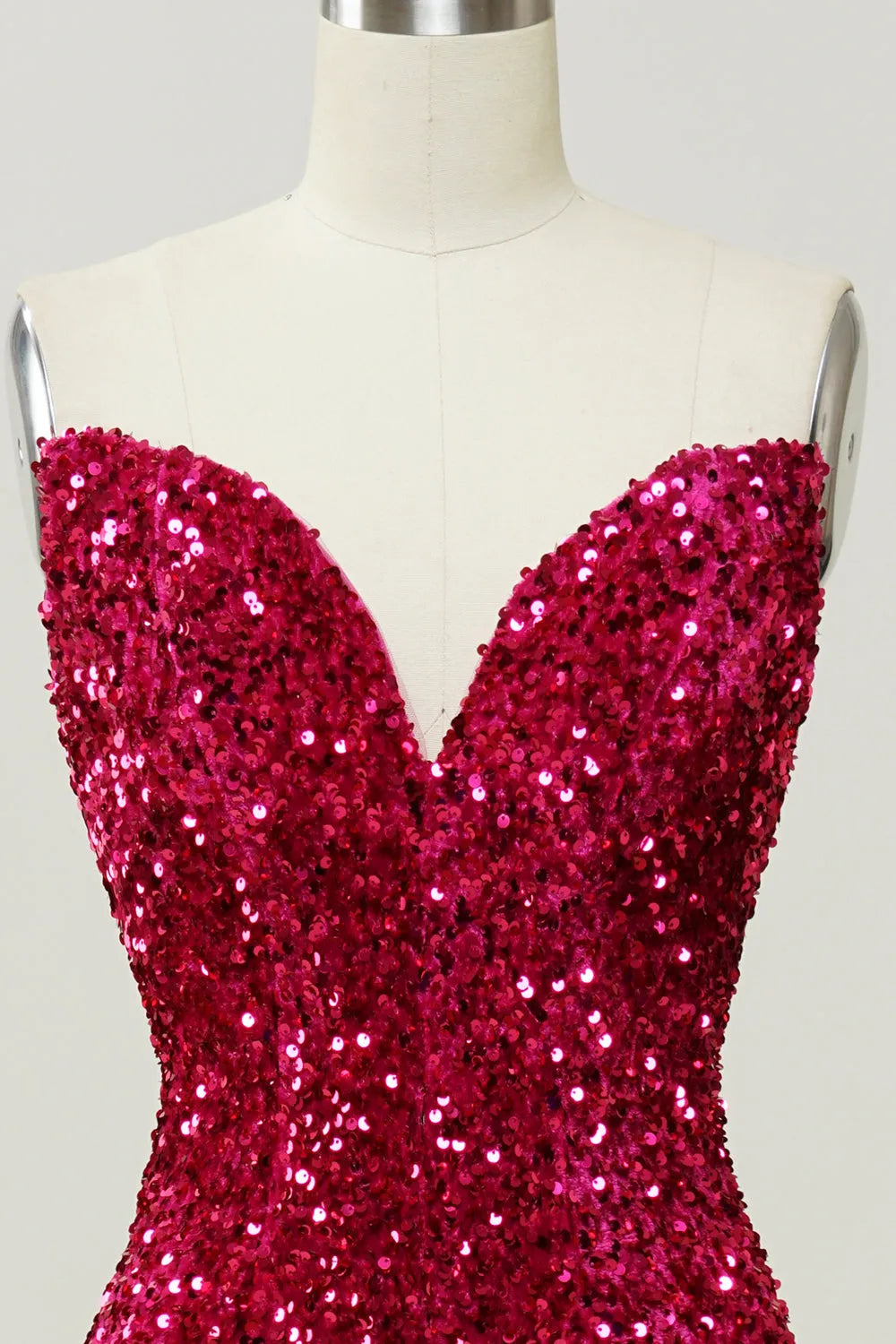 Model posing in the sequined mermaid prom dress.