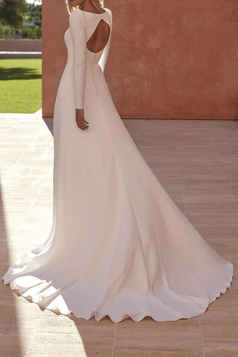 Elegant sleeveless A-line maxi wedding gown with shimmering details.