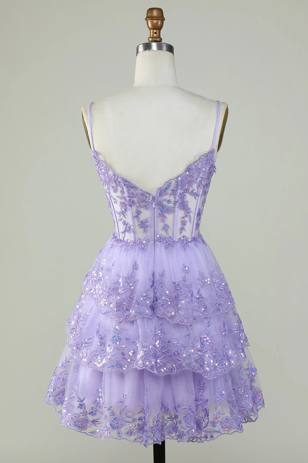 Back view of a purple sparkly corset mini party dress.