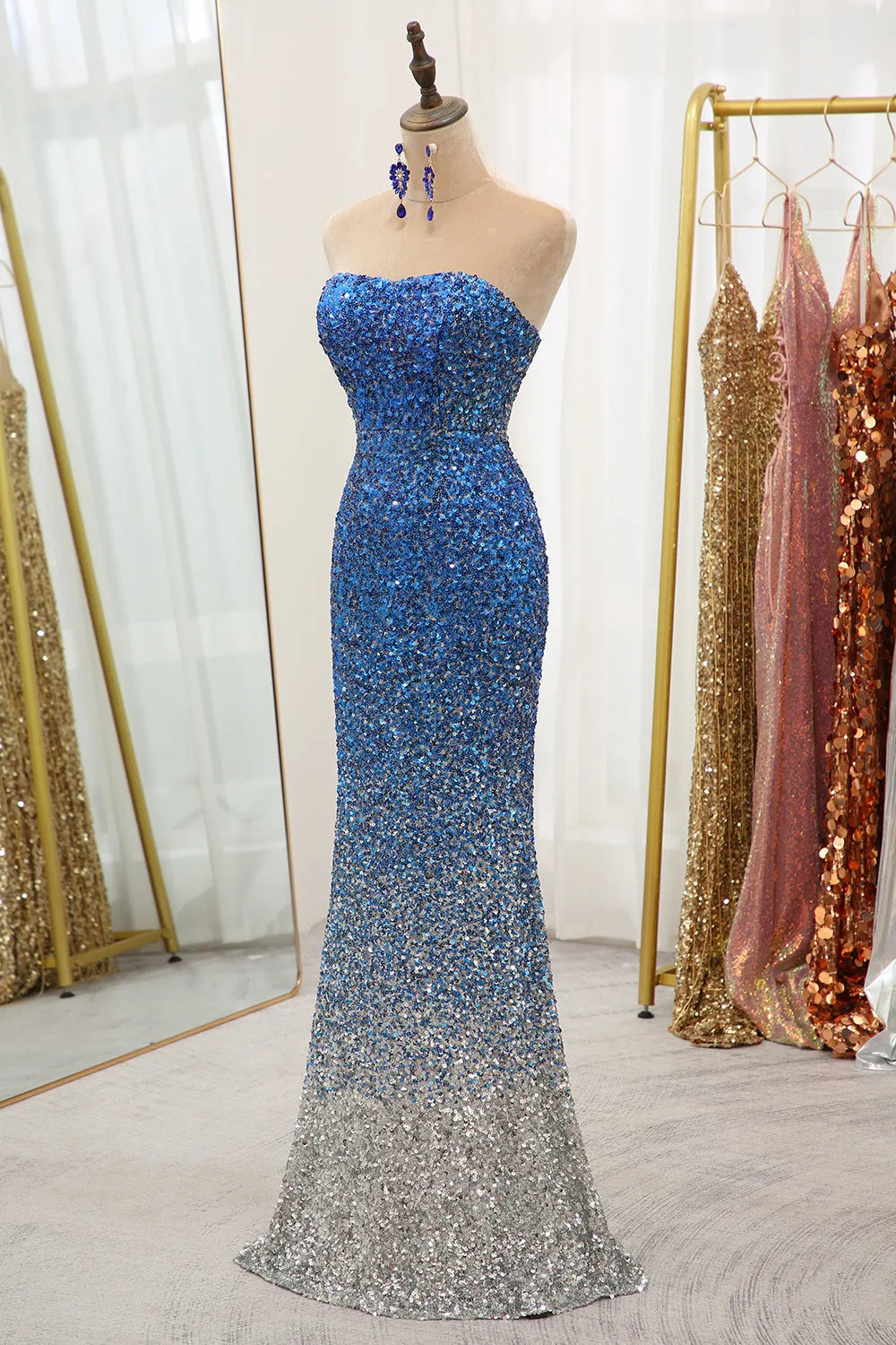 Back view of the long strapless mermaid prom dress.