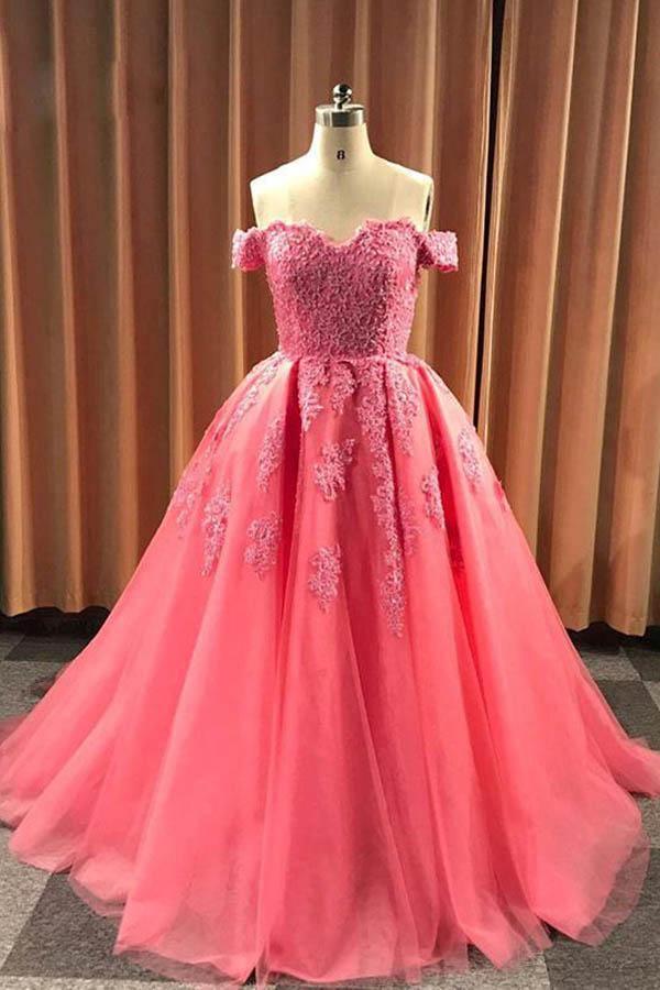 Full view of a glamorous strapless ball gown with lace appliques.