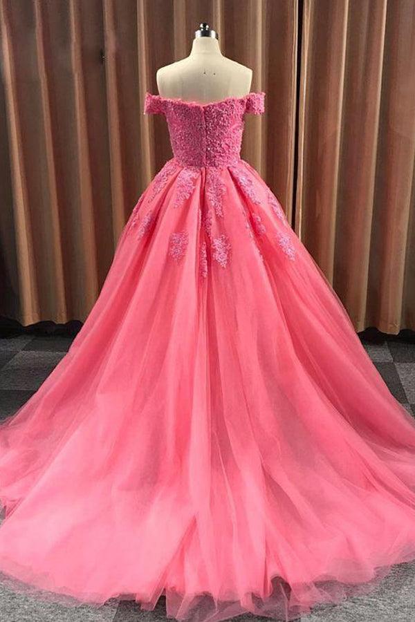 Side view of the elegant ball gown, highlighting lace appliques.