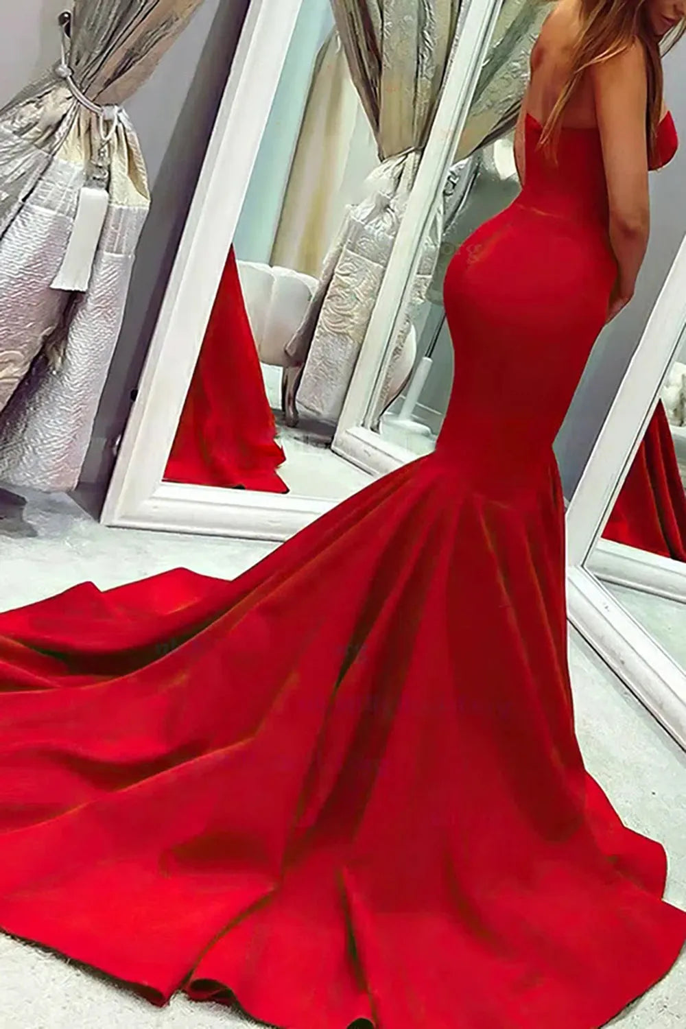 Elegant strapless mermaid satin long prom dress, side view.
