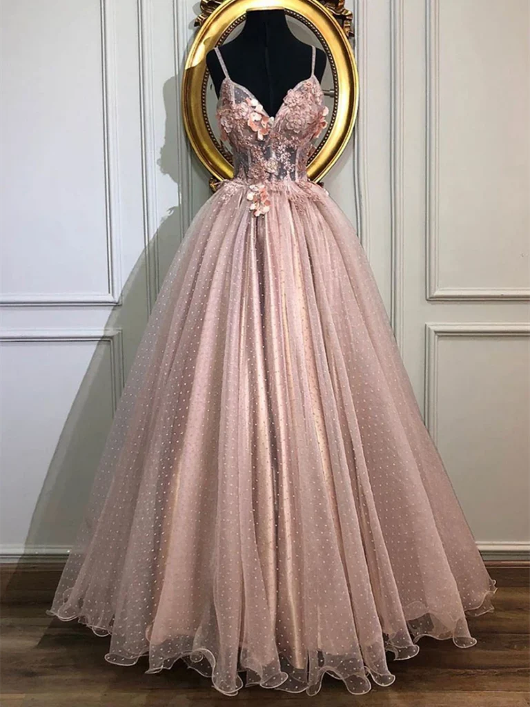 Full length view of a glamorous A-line long prom dress with a beaded sweetheart neckline and tulle lace skirt.