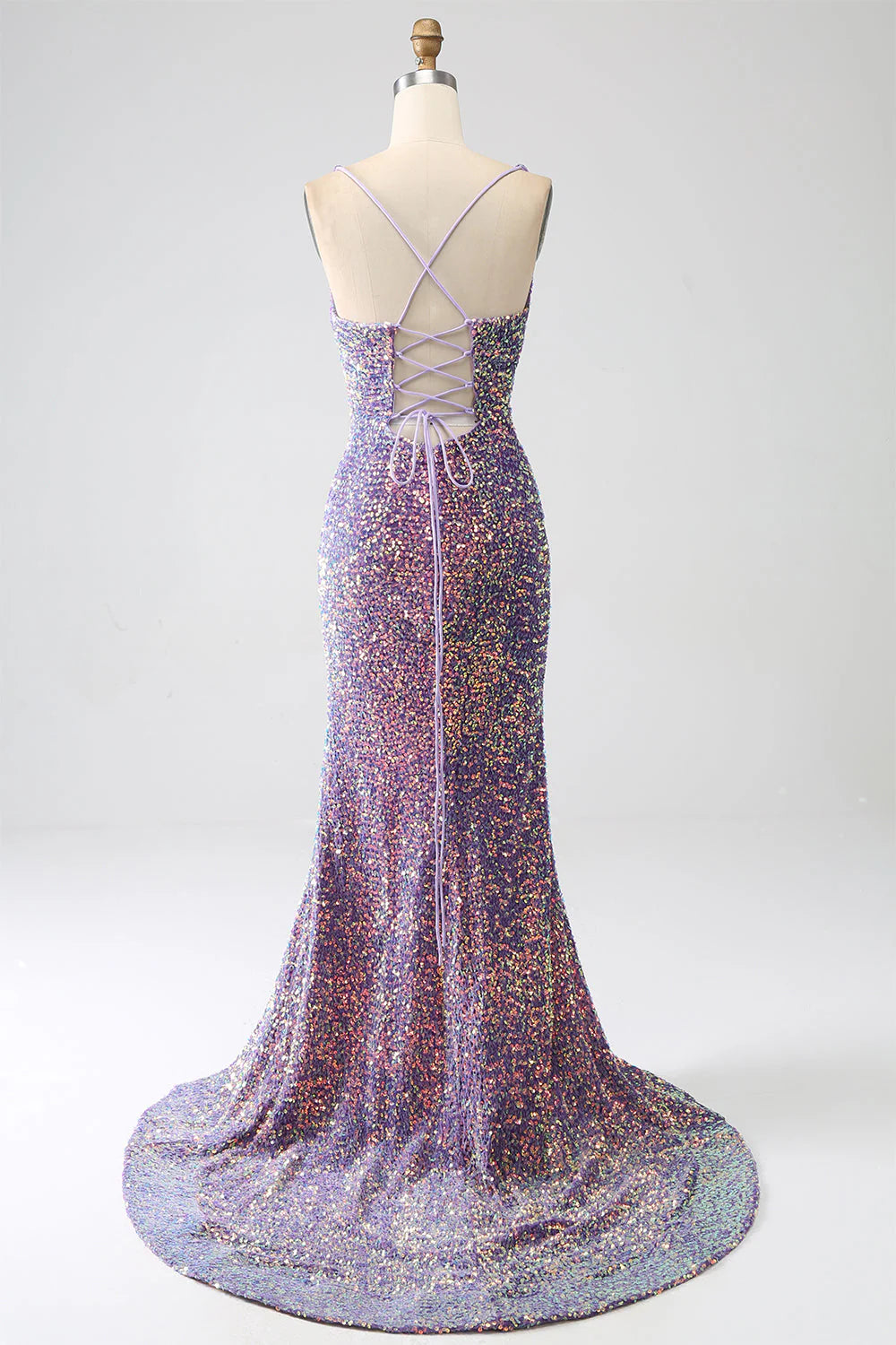 Side view of the light purple sequined mermaid dress, showcasing the elegant slit.