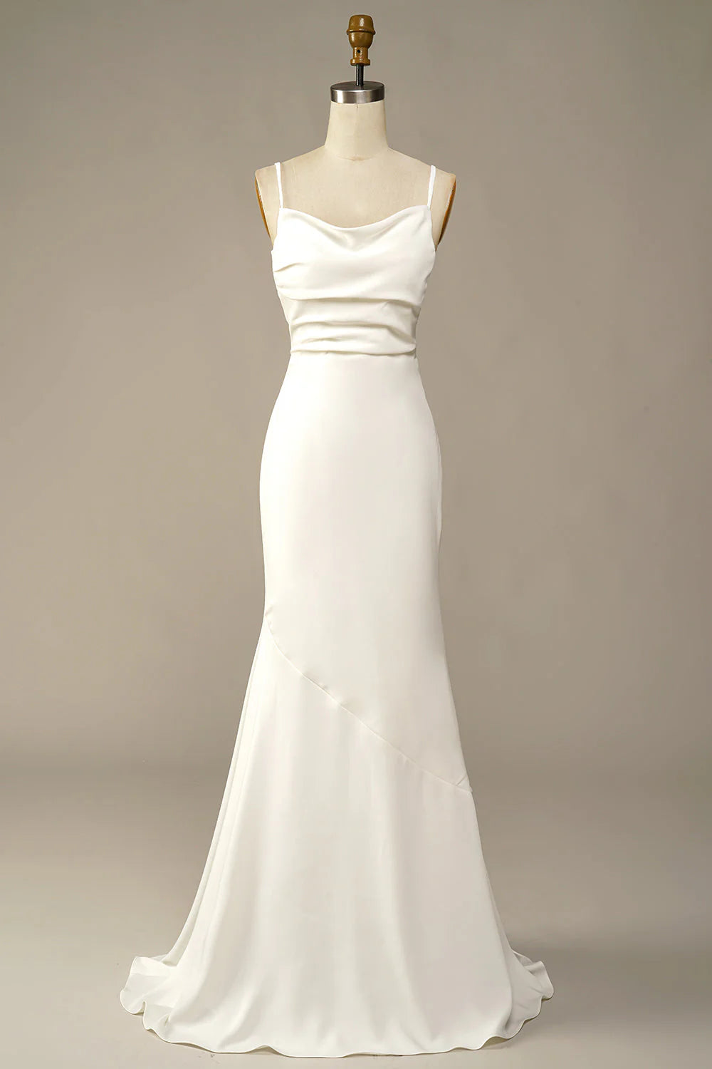 White mermaid wedding gown with sweetheart neckline and lace appliques.