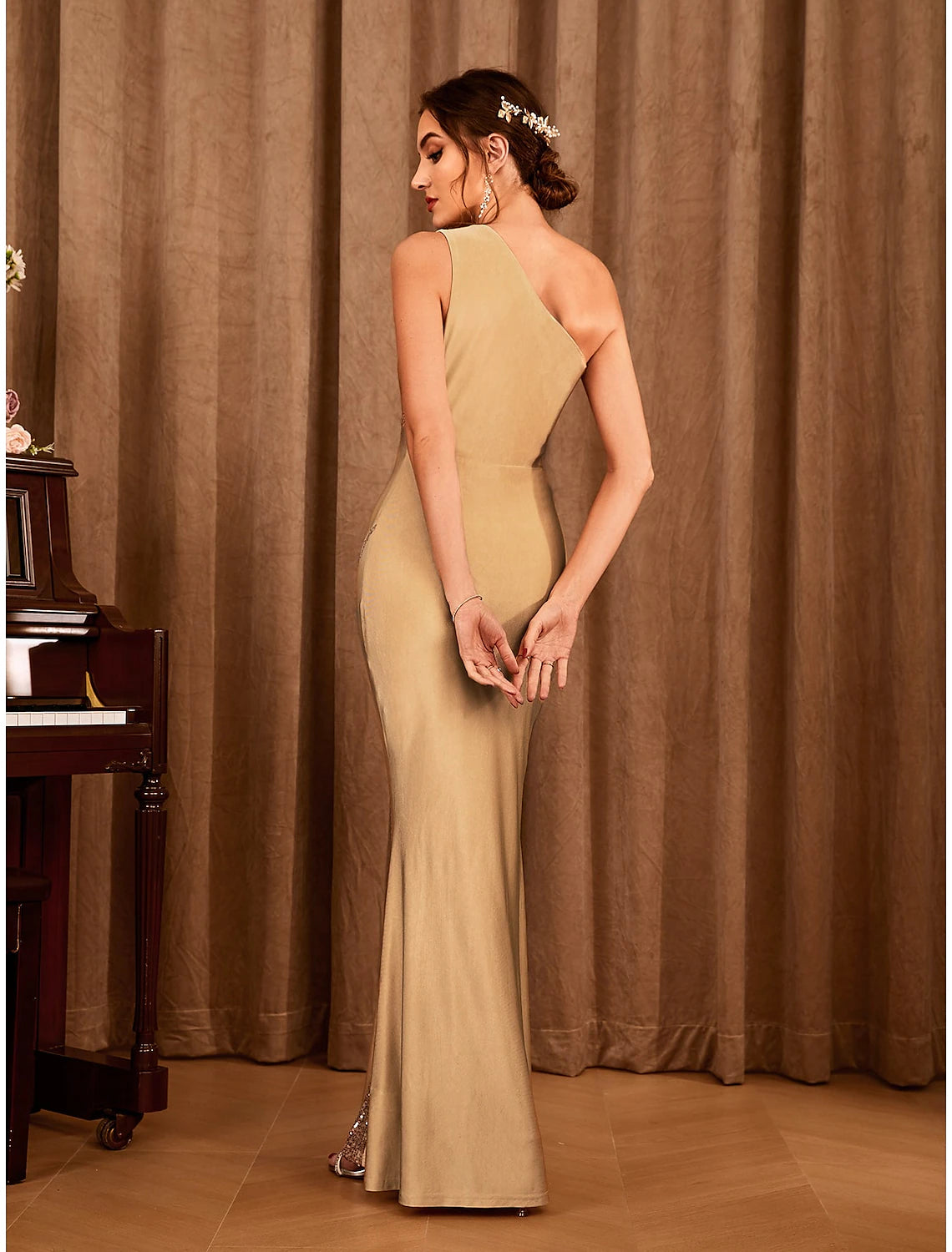 Close-up of the glitter stretch satin fabric on the mermaid trumpet dress.