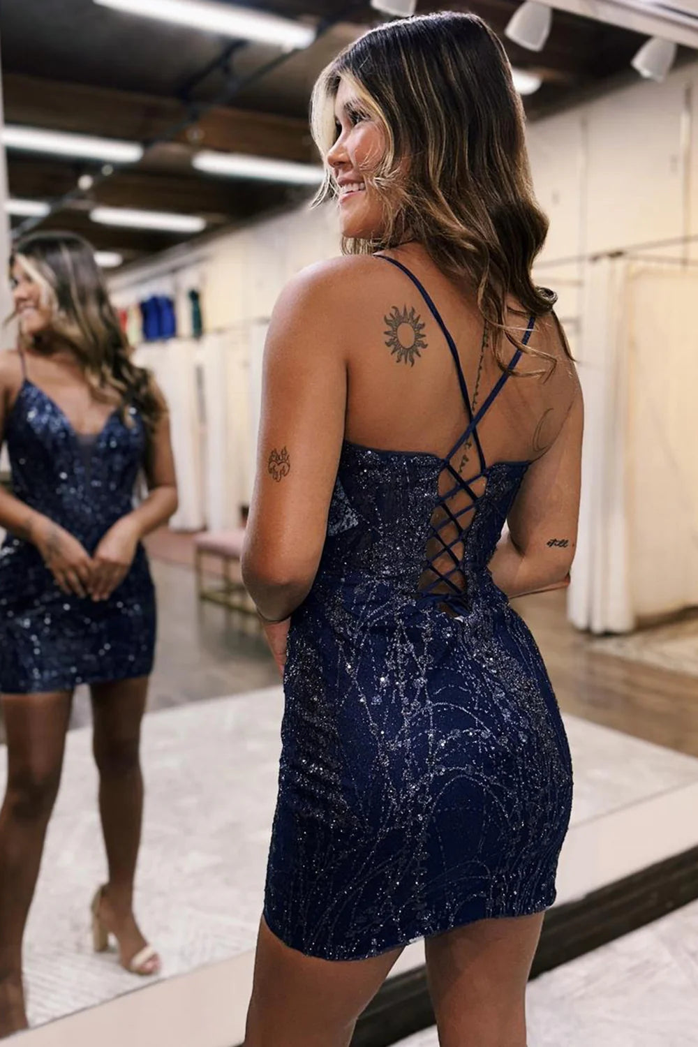Back view of the glitter V-neck short prom dress.