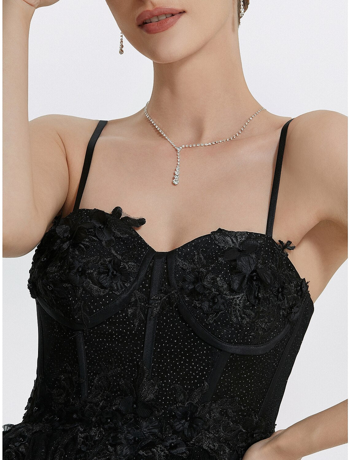 Full view of the sleeveless A-line gown, perfect for a masquerade or photoshoot.