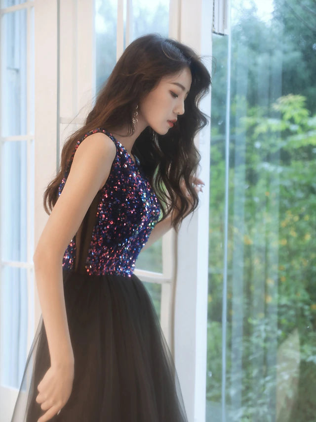 Close-up of the sequin detail on the A-line prom dress.