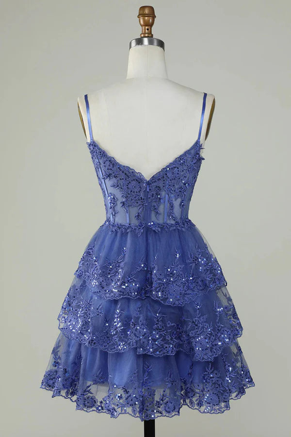 Close-up of glitter lace and corset detail on lavender dress.