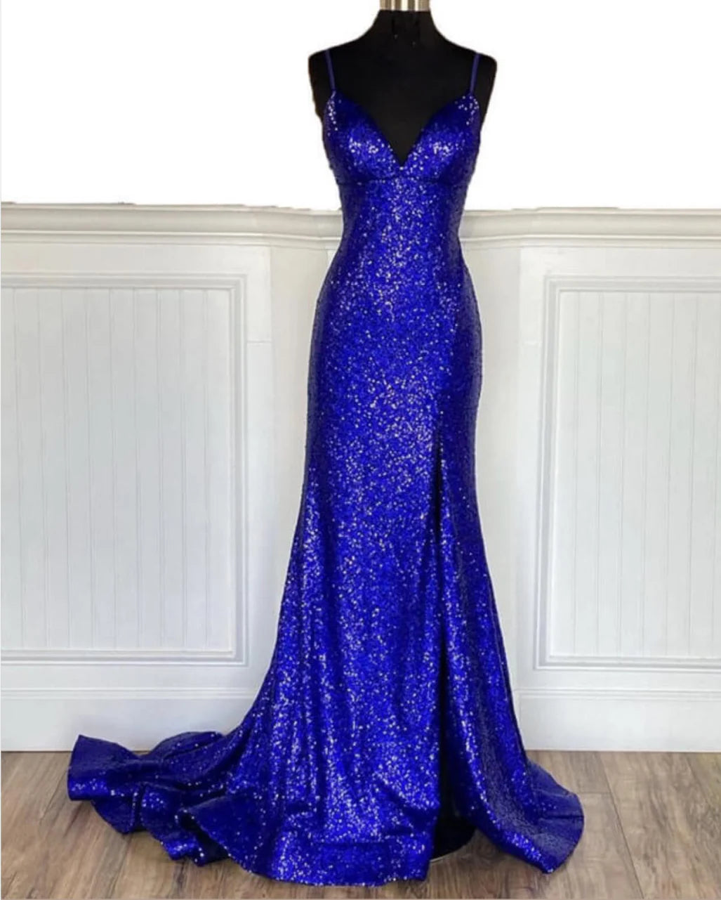 Royal blue mermaid prom dress with glitter sequins and V-neck.