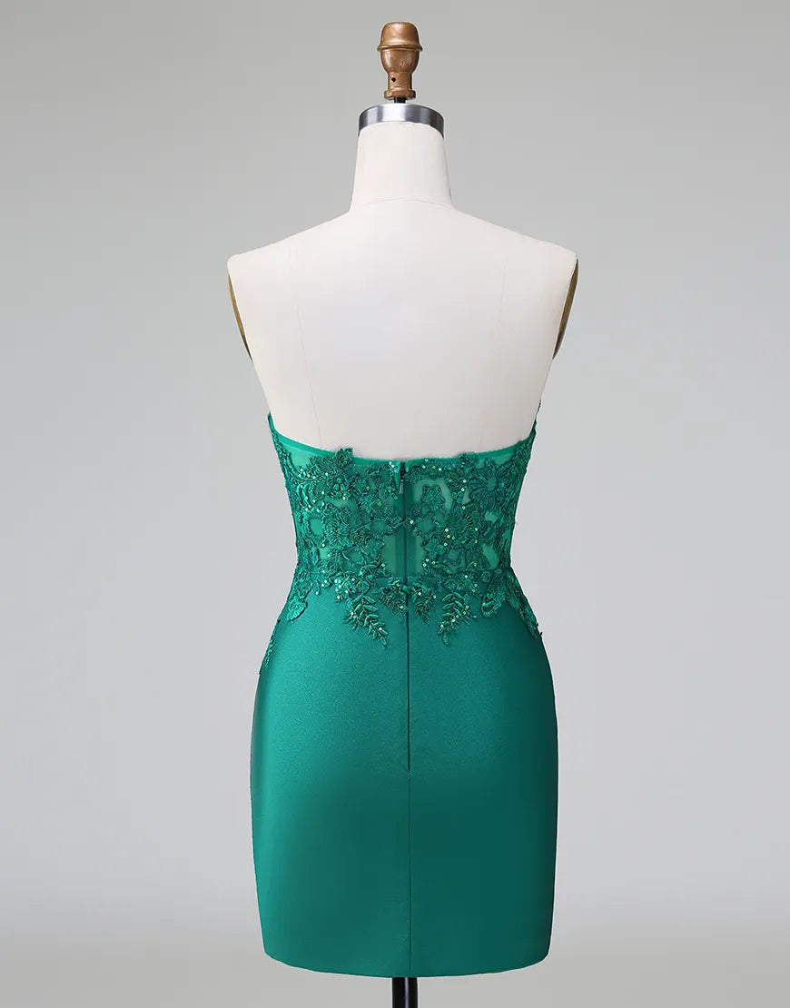 Close-up of the glittering green formal dress with intricate beading.