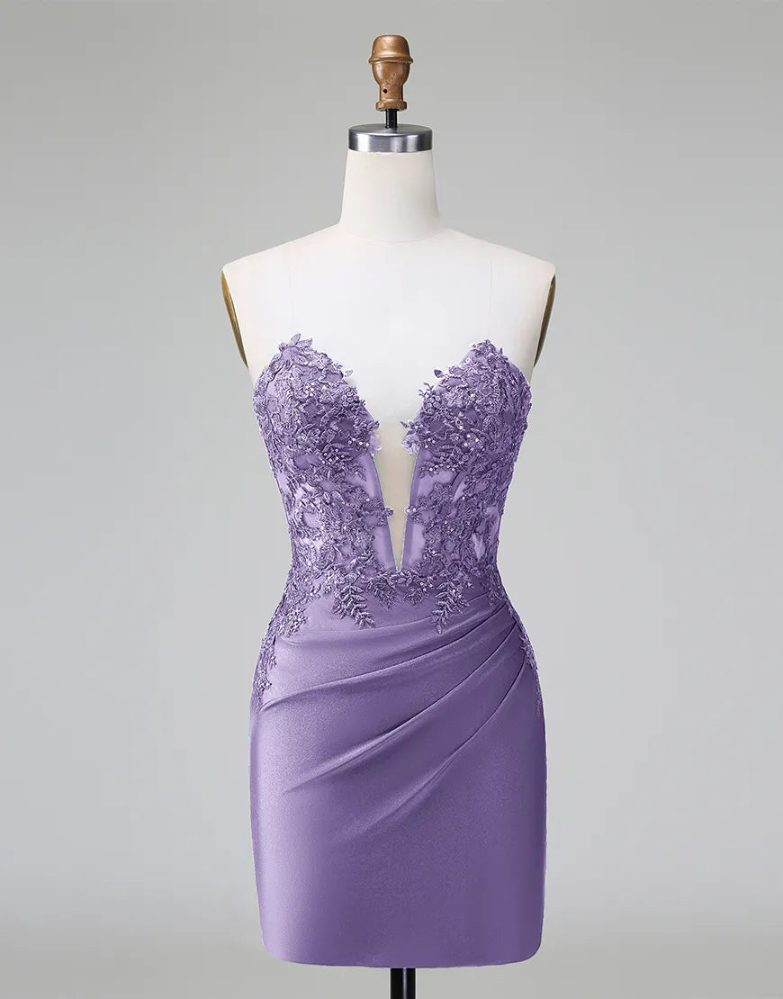 Model in a shimmering purple V-neck formal dress with appliques.