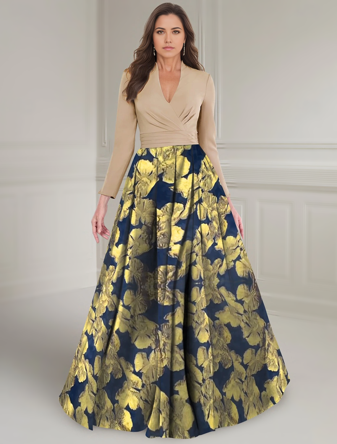 Woman wearing an elegant gold floral brocade A-line V-neck long sleeve Mother of the Bride dress.