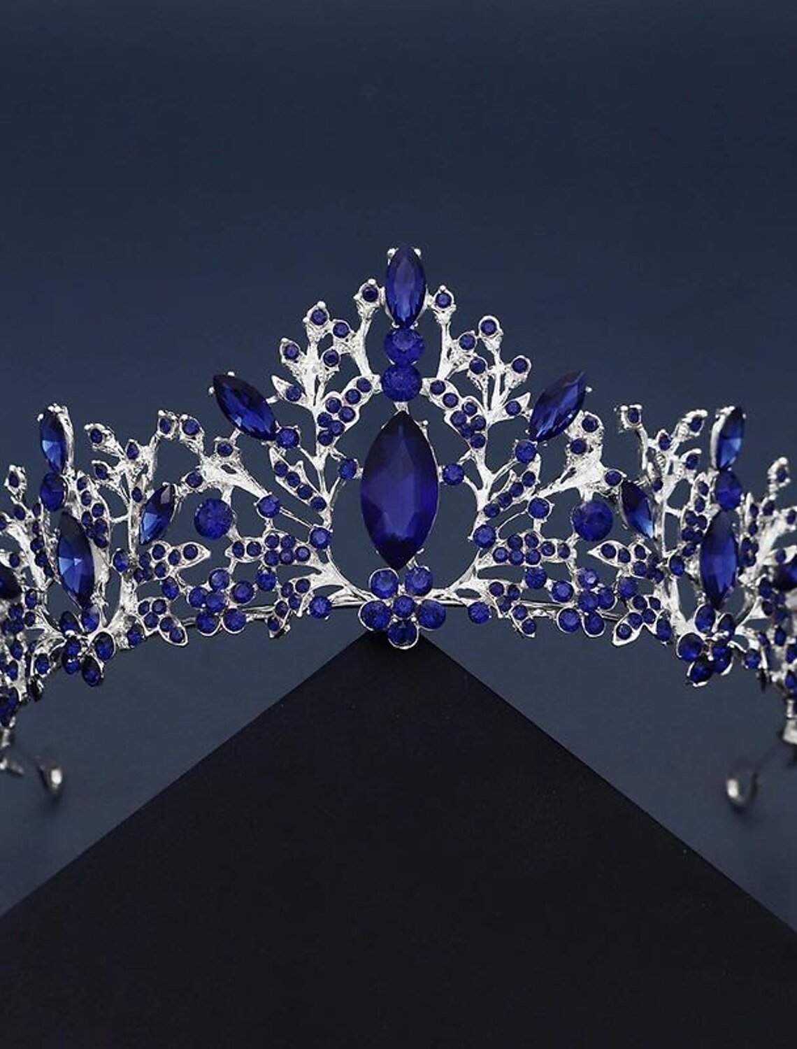 Golden crystal tiara crown on a white background.