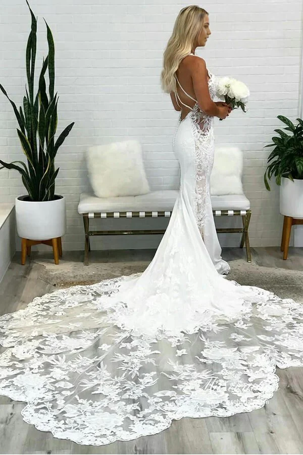 Back view of a mermaid wedding dress, showcasing the backless design and intricate lace.