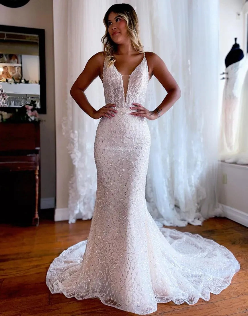 Elegant mermaid deep V-neck glitter wedding dress.