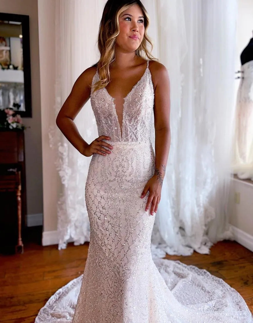 Mermaid deep V-neck glitter wedding dress, back view.