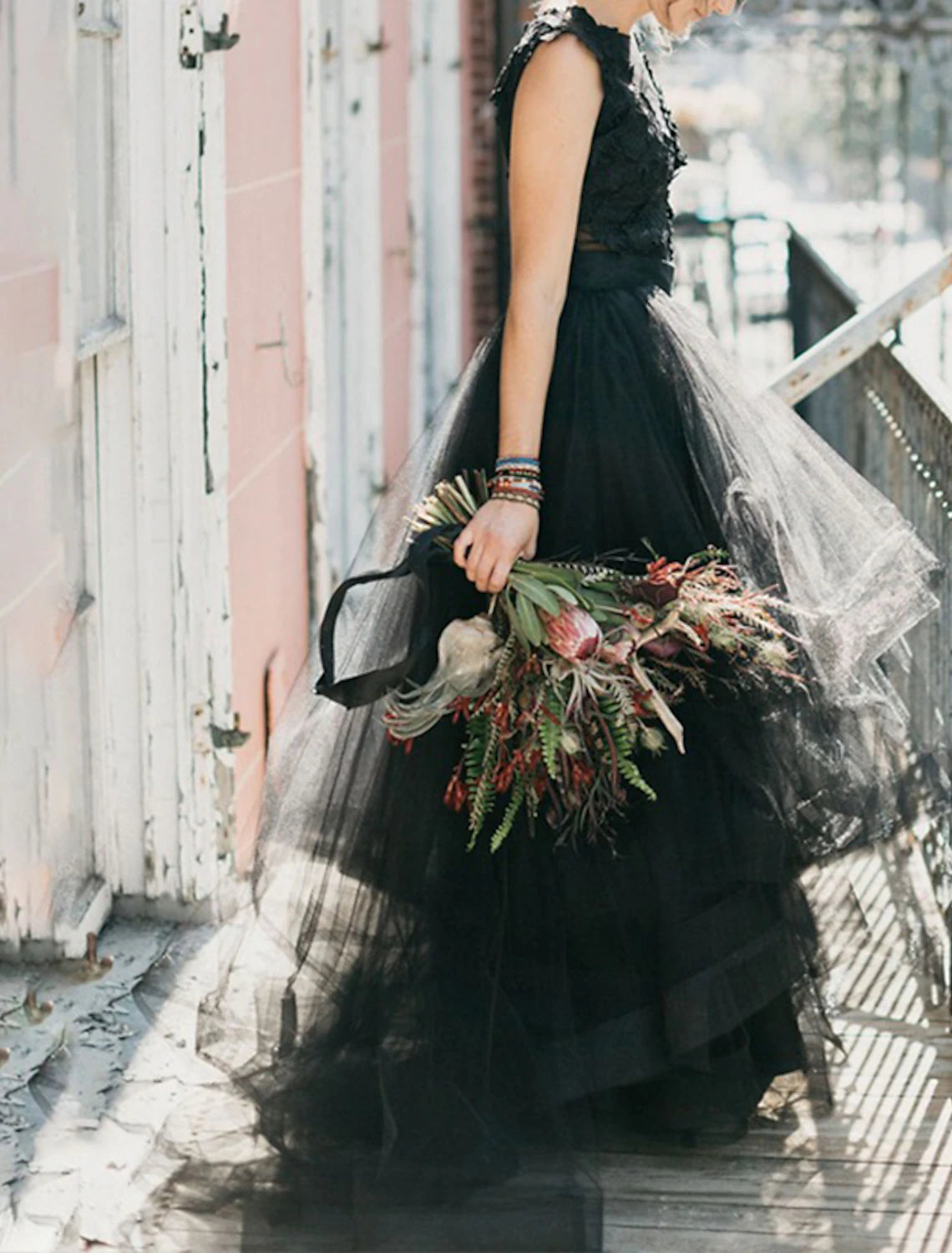 Back view of the sleeveless gothic bridal dress, highlighting the train.