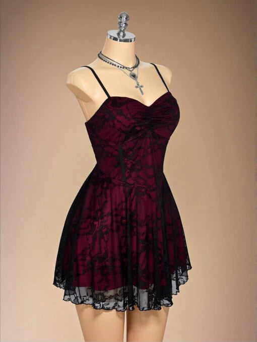 Back view of gothic short formal dress with delicate lace hem.