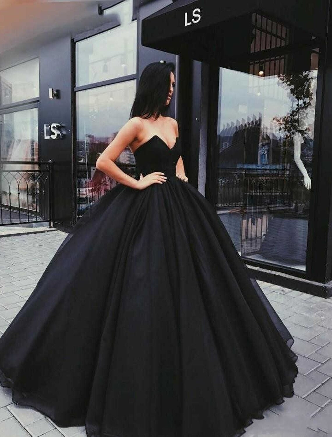 Back view of Gothic black floor-length bridal gown.