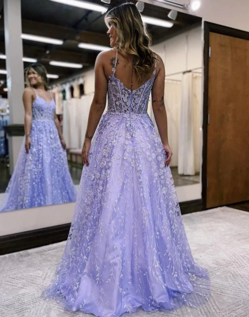 Back view of A-line prom dress with spaghetti straps.