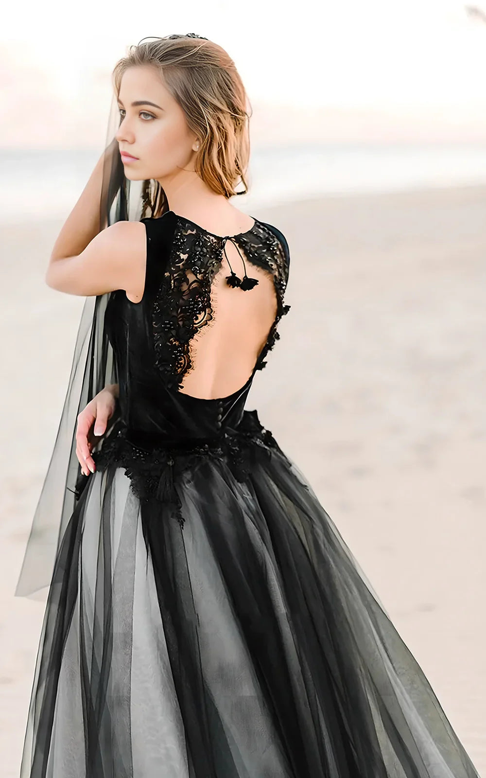 Back view of an A-Line wedding dress showing the keyhole detail and floor-length skirt.
