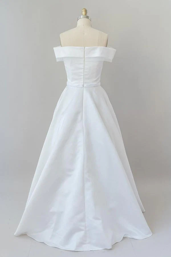 Full view of the graceful satin bridal dress.