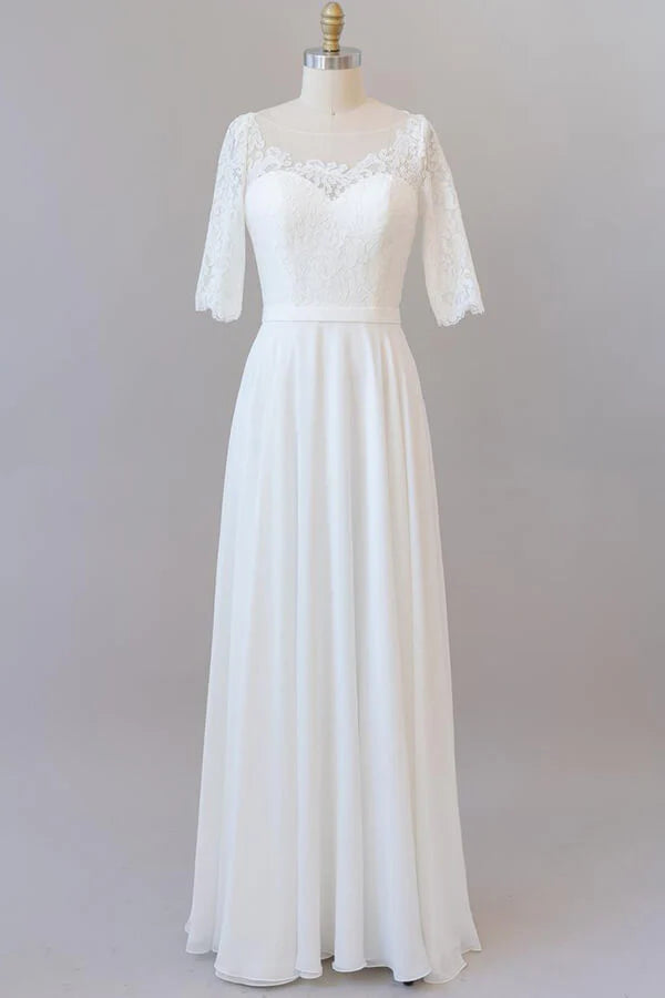 Graceful A-line lace and chiffon wedding dress with long sleeves.
