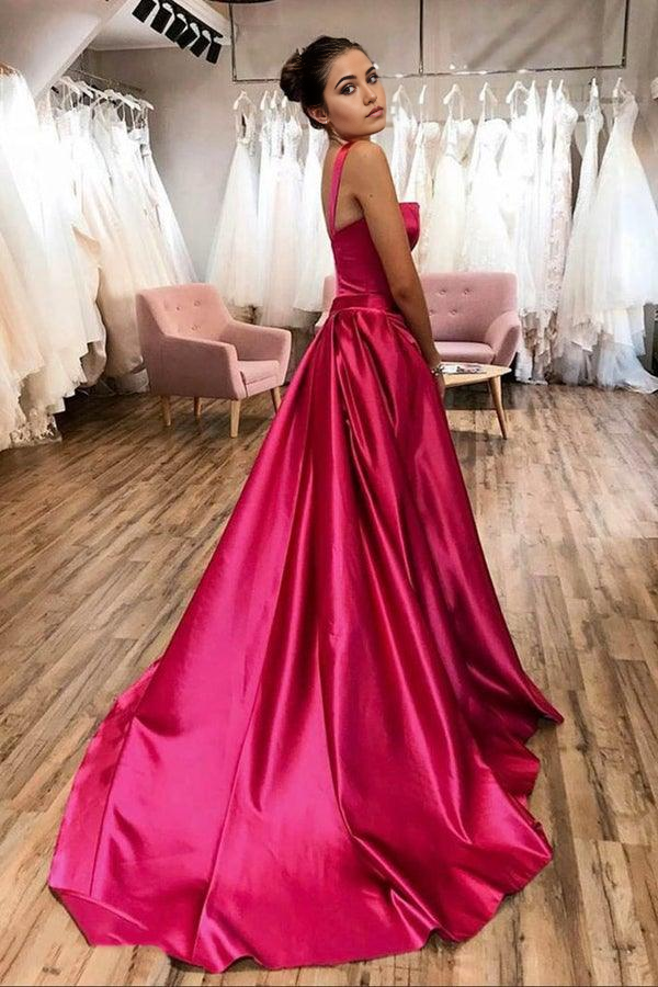 Back view of a hot pink A-line satin long evening dress showing the court train.