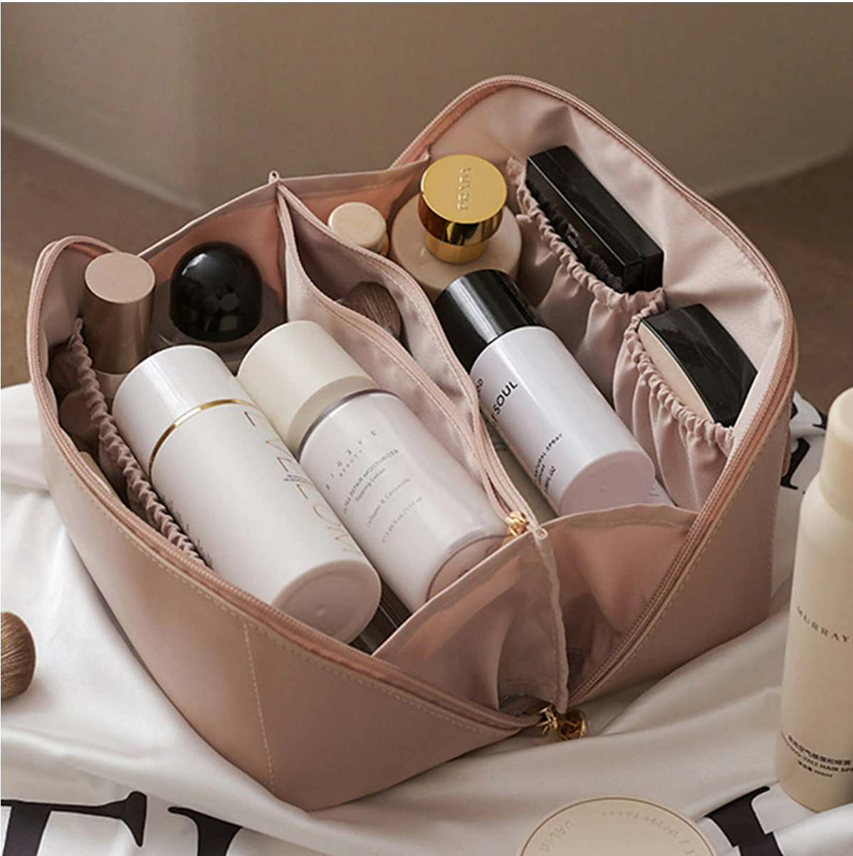 Closed large capacity PU leather travel cosmetic bag with handle.