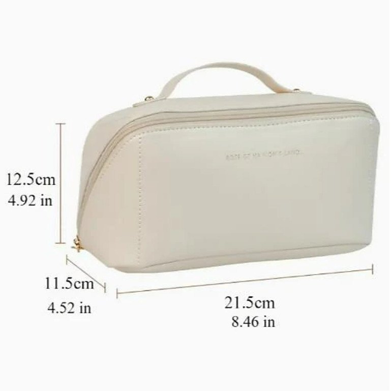 Open travel cosmetic bag showing adjustable dividers and spacious compartments.