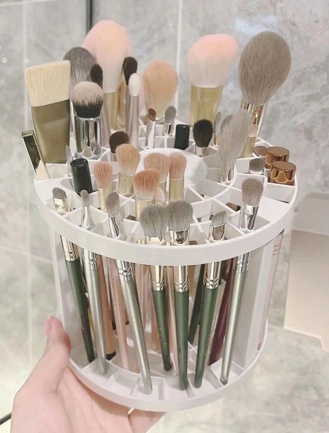 Side view of the large capacity round plastic organizer.