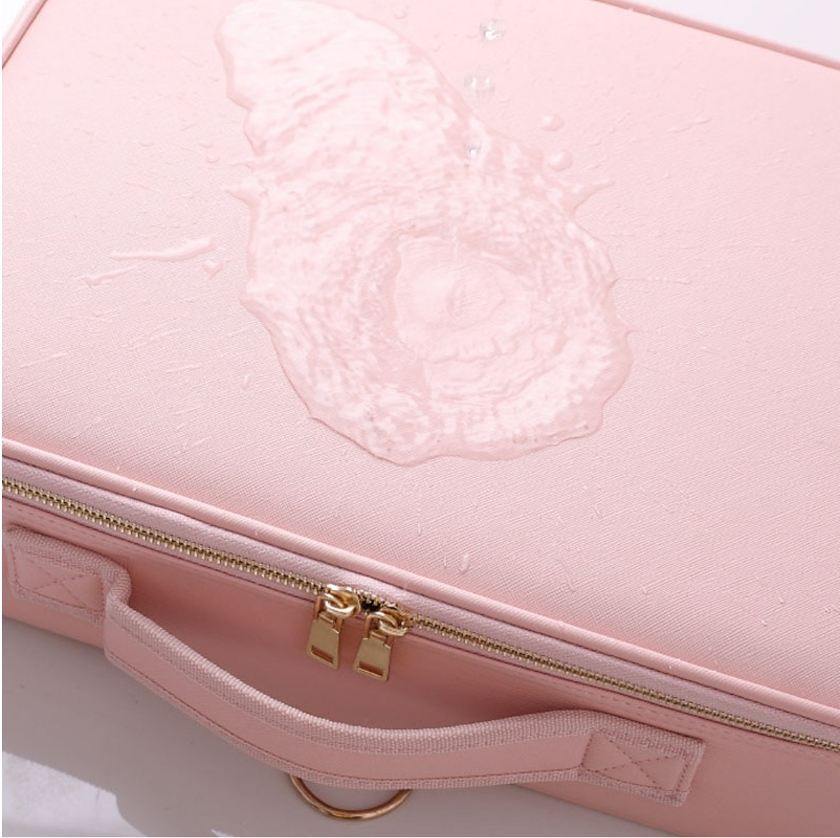 Portable travel makeup organizer with handle.