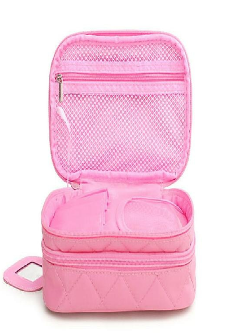 Person holding the black toiletry bag by its handle.