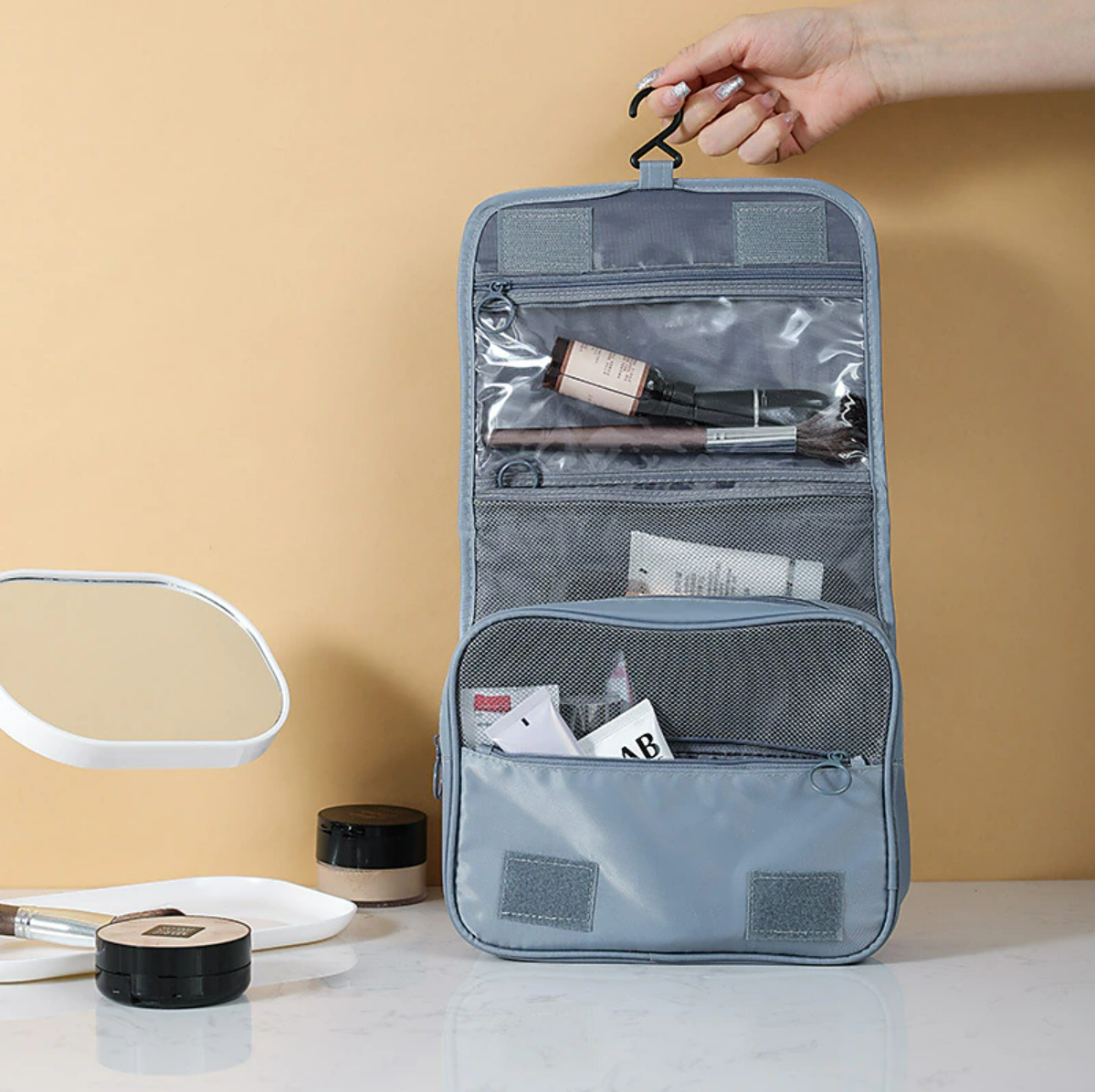 Open waterproof makeup bag showing spacious interior.