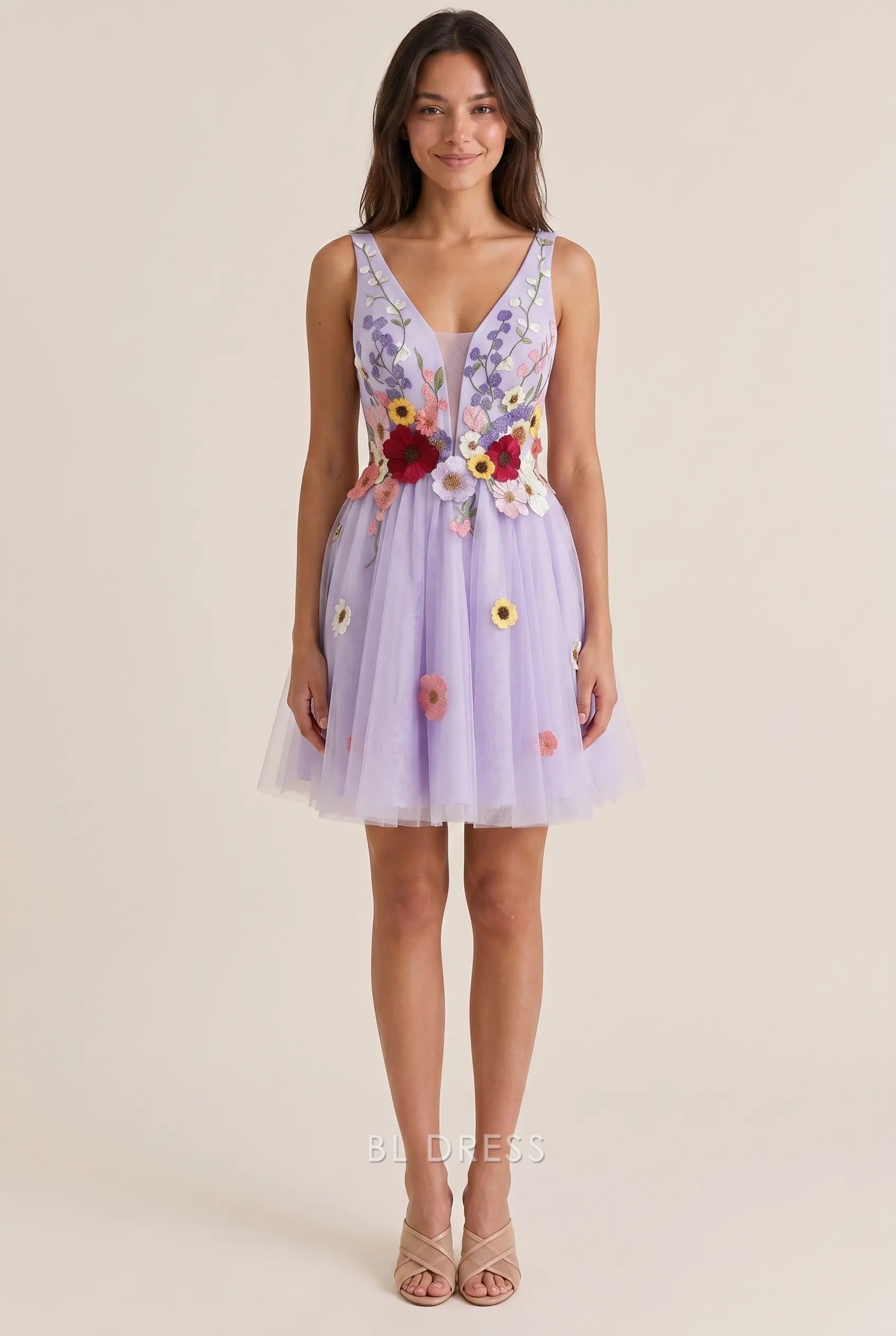 Model wearing a lavender A-line mini homecoming dress with V-neck and multicolor 3D floral appliqués.