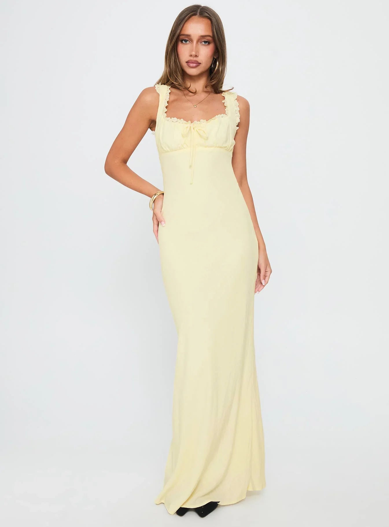Light Yellow Spaghetti Strap Prom Dress with Lace Trim and Tie Back for Formal Events and Prom Nights