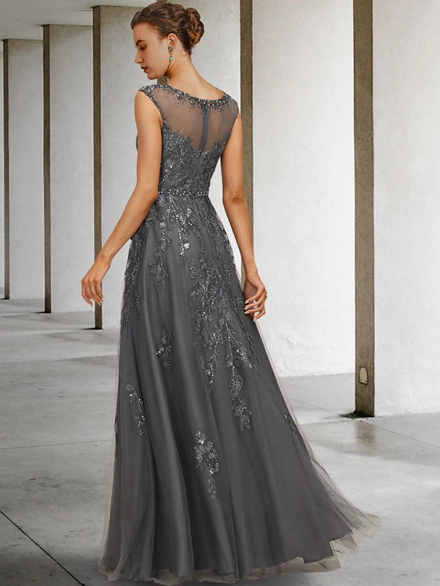 Back view of the A-line Mother of the Bride dress showcasing floor length and embellishments.