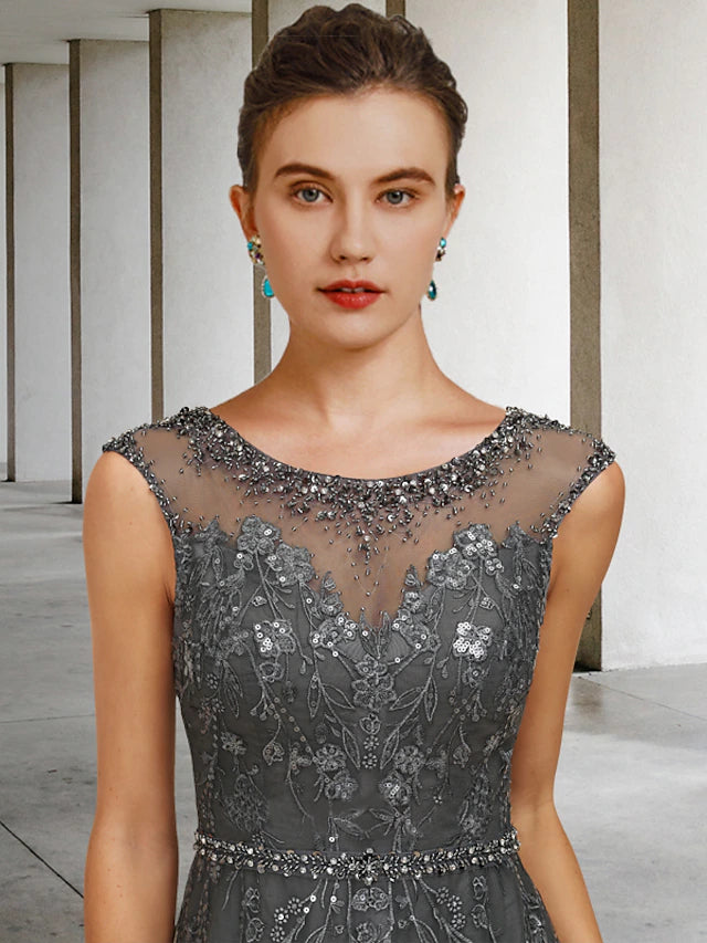 Close-up of the lace, beading, and sequin details on the Mother of the Bride dress.