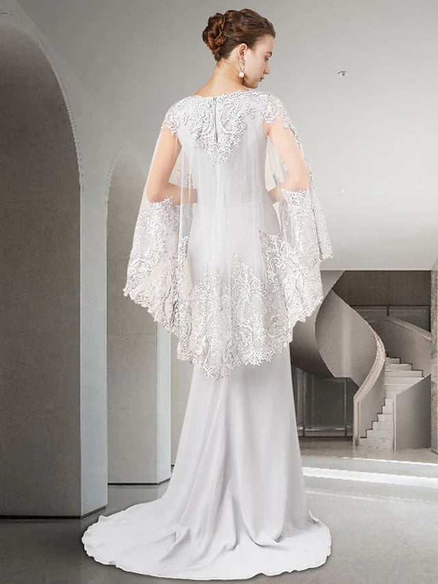 Full length view of the elegant Sheath Mother of the Bride gown with a sweep train and intricate appliques.