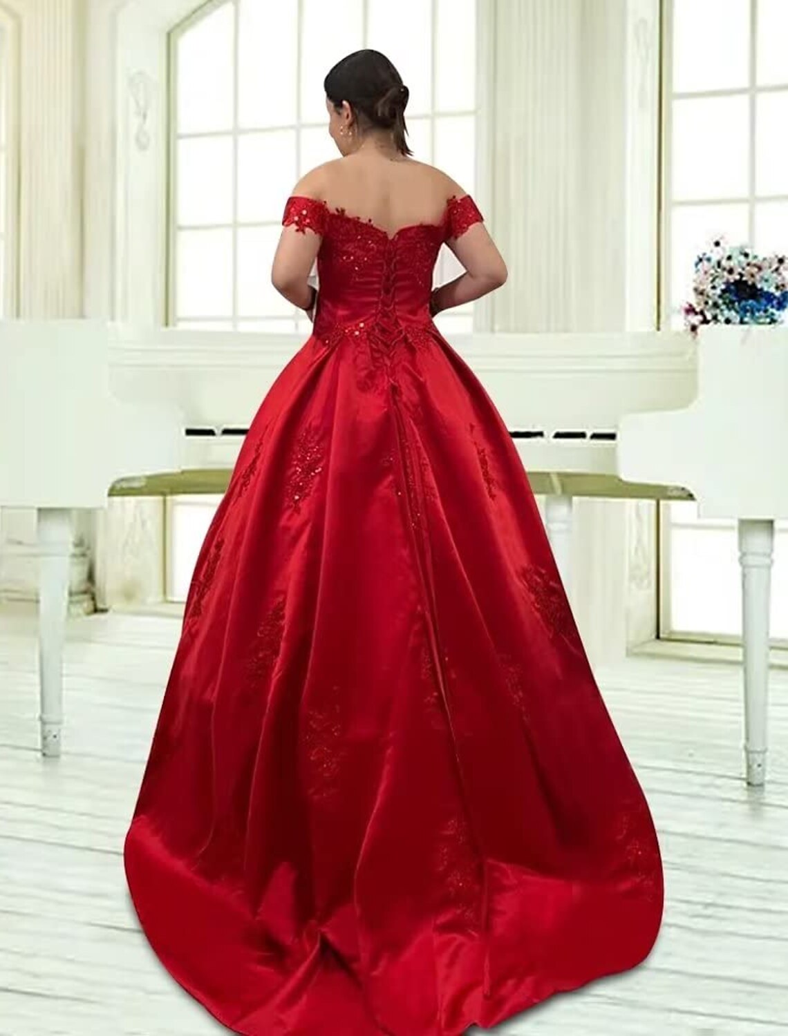 Close-up of the bodice and off-shoulder neckline of the ball gown.