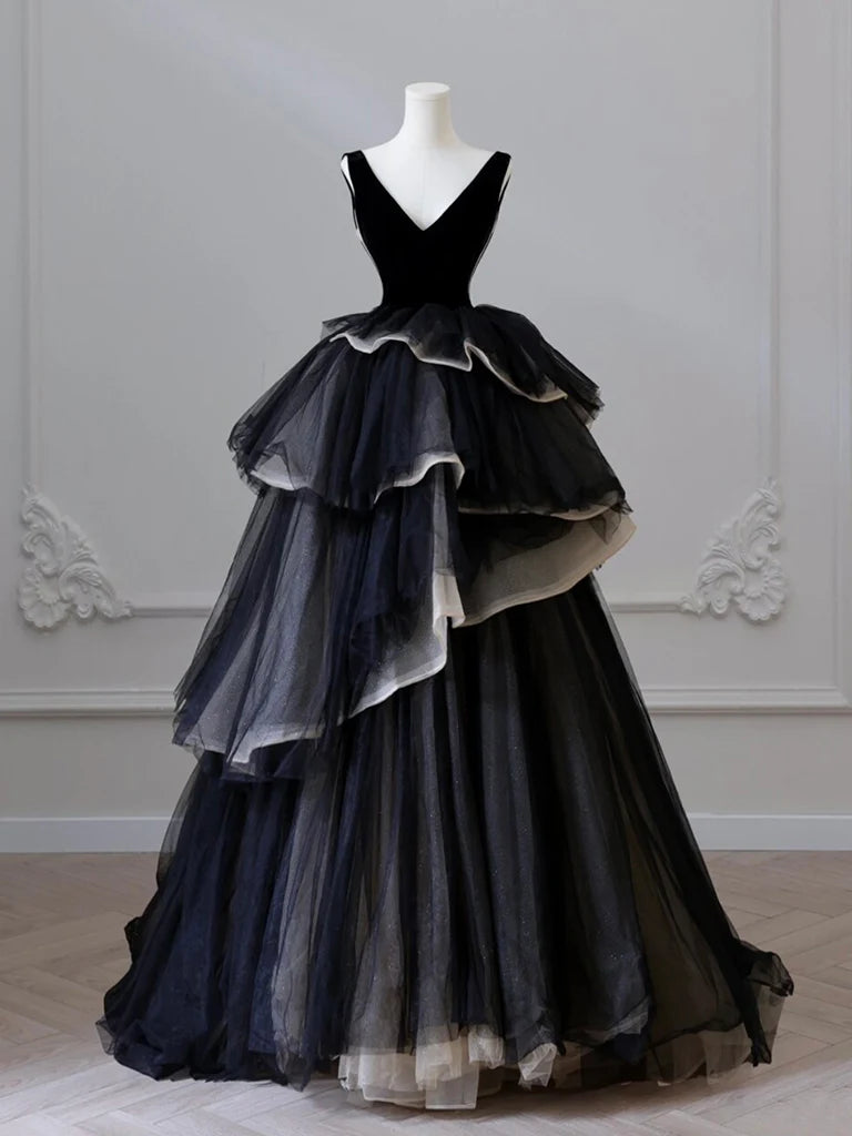 Close-up of the V-neckline and velvet bodice of the gown.